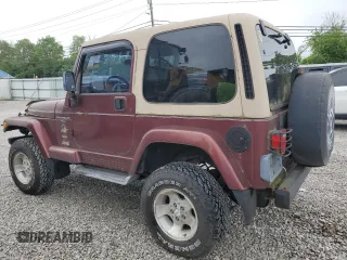 2001 Jeep Wrangler Sahara z VIN 1J4FA59SX1P305100, wystawiony jako Copart lot #58606685 z przebiegiem 76 856 mil mil oraz Czysty tytuł • Clean title. Historia ofert i sprzedaży dostępna na DreamBid. Obrazek 2.