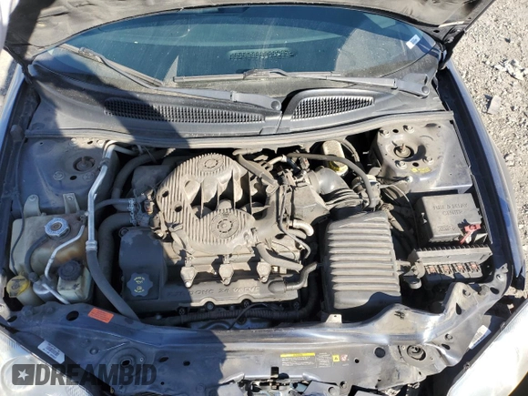 2006 Dodge Stratus SXT z VIN 1B3EL46R46N185788, wystawiony jako Copart lot #71580104 z przebiegiem 104 390 mil mil oraz Szkoda całkowita • Salvage title. Historia ofert i sprzedaży dostępna na DreamBid. Obrazek 12.