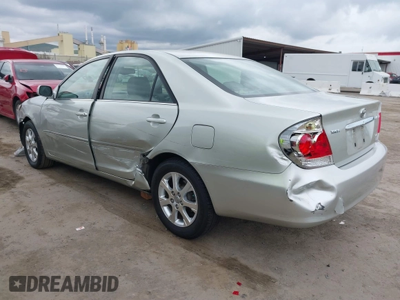 2005 Toyota Camry LE with VIN JTDBF30K650163057, listed as a IAAI auction lot 41730270 with 98,300 mi miles and . Bid and sale history available at DreamBid. Image 3.