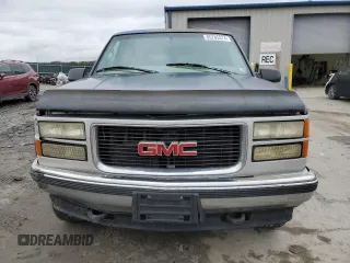 1997 GMC Suburban z VIN 1GKFK16R3VJ761305, wystawiony jako Copart lot #85785574 z przebiegiem 269 721 mil mil oraz Szkoda całkowita • Salvage title. Historia ofert i sprzedaży dostępna na DreamBid. Obrazek 5.