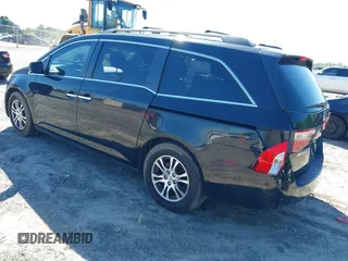 2011 Honda Odyssey EX-L with VIN 5FNRL5H67BB087064, listed as a IAAI auction lot 42326427 with 177,795 mi miles and . Bid and sale history available at DreamBid. Image 3.