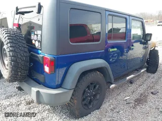 2009 Jeep Wrangler Unlimited X with VIN 1J4GA39199L724445, listed as a IAAI auction lot 41722542 with 1 mi miles. Bid and sale history available at carsss.com. Image 4.