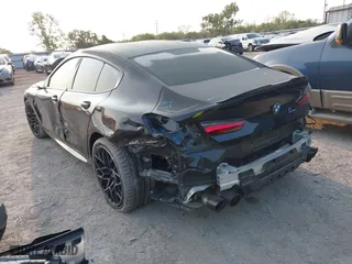 2020 BMW M8 with VIN WBSGV0C06LCD99264, listed as a IAAI auction lot 40276722 with 38,039 mi miles. Bid and sale history available at carsss.com. Image 3.