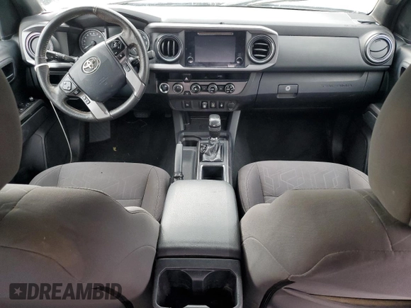 2018 Toyota Tacoma SR z VIN 3TMCZ5AN2JM122416, wystawiony jako Copart lot #61351225 z przebiegiem Nie podano mil oraz Szkoda całkowita • Salvage title. Historia ofert i sprzedaży dostępna na DreamBid. Obrazek 8.