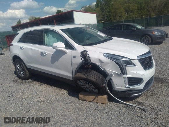 2023 Cadillac XT5 AWD Premium Luxury with VIN 1GYKNDRS5PZ141071, listed as a IAAI auction lot 36571530 with 2,822 mi miles and . Bid and sale history available at DreamBid. Image 1.