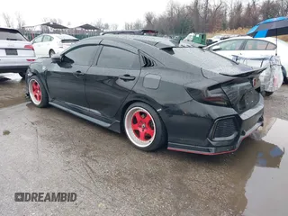 2019 Honda Civic Si z VIN 2HGFC1E51KH704185, wystawiony jako IAAI lot #41855464 z przebiegiem 110 106 mil mil oraz . Historia ofert i sprzedaży dostępna na DreamBid. Obrazek 3.
