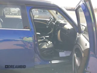 2015 MINI Countryman with VIN WMWZB3C56FWR43443, listed as a IAAI auction lot 41920848 with 91,192 mi miles and . Bid and sale history available at DreamBid. Image 5.