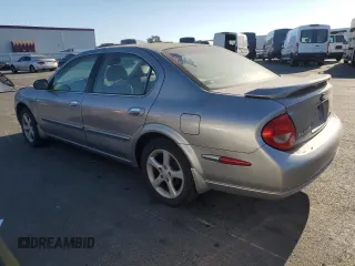 2001 Nissan Maxima SE 20th Anniversary. z VIN JN1CA31A91T314977, wystawiony jako Copart lot #75260034 z przebiegiem 178 471 mil mil oraz Szkoda całkowita • Salvage title. Historia ofert i sprzedaży dostępna na DreamBid. Obrazek 2.