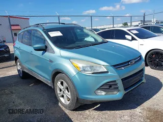 2013 Ford Escape SE with VIN 1FMCU0GX6DUA85991, listed as a IAAI auction lot 42222248 with 136,457 mi miles and . Bid and sale history available at DreamBid. Image 1.