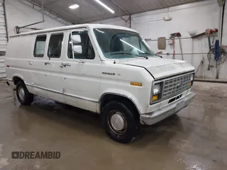 1988 Ford Econoline Cargo z VIN 1FTEE14Y4JHB27446, wystawiony jako IAAI lot #42434641 z przebiegiem 56 435 mil mil oraz . Historia ofert i sprzedaży dostępna na DreamBid. Obrazek 1.
