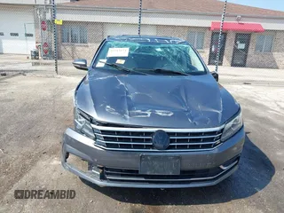 2017 Volkswagen Passat SE with VIN 1VWBT7A36HC039748, listed as a IAAI auction lot 41915674 with 57,012 mi miles and . Bid and sale history available at DreamBid. Image 6.