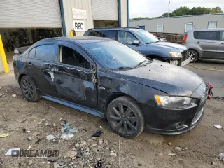 2015 Mitsubishi Lancer GT with VIN JA32U8FW6FU012323, listed as a Copart auction lot 73822644 with 69,317 mi miles and Salvage Title. Bid and sale history available at carsss.com. Image 4.