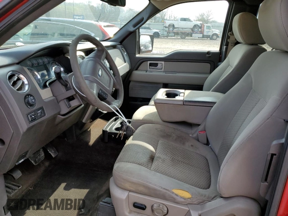 2009 Ford F-150 STX with VIN 1FTRX12869FB02974, listed as a Copart auction lot 52781725 with 130,583 mi miles and Salvage title. Bid and sale history available at DreamBid. Image 7.