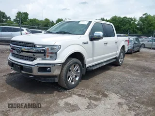 2018 Ford F-150 XL with VIN 1FTEW1EG7JKE76476, listed as a IAAI auction lot 42575219 with 183,308 mi miles and . Bid and sale history available at DreamBid. Image 2.