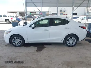 2016 Scion iA with VIN 3MYDLBZV3GY101182, listed as a IAAI auction lot 41788071 with 92,406 mi miles. Bid and sale history available at carsss.com. Image 14.