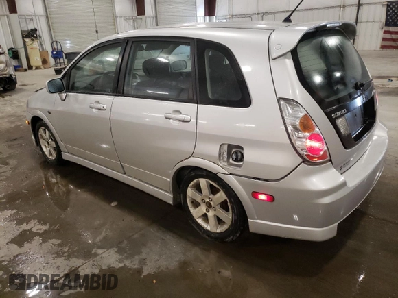 2005 Suzuki Aerio SX z VIN JS2RC61H555300879, wystawiony jako Copart lot #80481084 z przebiegiem 129 196 mil mil oraz Szkoda całkowita • Salvage title. Historia ofert i sprzedaży dostępna na DreamBid. Obrazek 2.