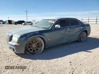 2005 Chrysler 300 C z VIN 2C3JA63H15H521662, wystawiony jako Copart lot #50518655 z przebiegiem Nie podano mil oraz Szkoda całkowita • Salvage title. Historia ofert i sprzedaży dostępna na DreamBid. Obrazek 1.