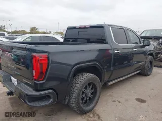 2020 GMC Sierra 1500 Denali with VIN 3GTU9FEL6LG360466, listed as a IAAI auction lot 41100892 with 84,881 mi miles. Bid and sale history available at carsss.com. Image 4.