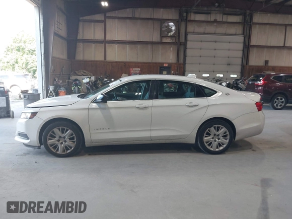 2015 Chevrolet Impala LS with VIN 2G11X5SL6F9138377, listed as a IAAI auction lot 42618022 with 122,811 mi miles and . Bid and sale history available at DreamBid. Image 14.