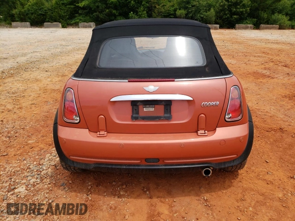 2006 MINI Convertible with VIN WMWRF335X6TF64910, listed as a Copart auction lot 60222215 with 85,761 mi miles and Salvage title. Bid and sale history available at DreamBid. Image 6.