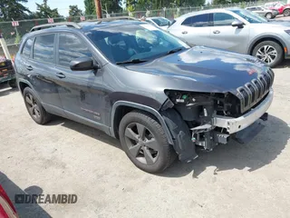 2016 Jeep Cherokee Latitude z VIN 1C4PJMCB9GW293047, wystawiony jako IAAI lot #42325392 z przebiegiem 127 706 mil mil oraz . Historia ofert i sprzedaży dostępna na DreamBid. Obrazek 1.