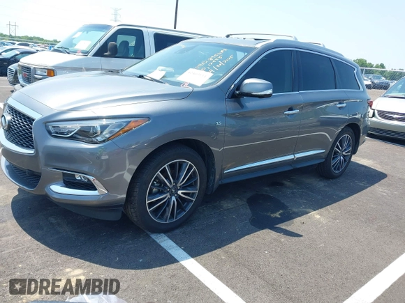 2019 Infiniti QX60 Pure with VIN 5N1DL0MN7KC563655, listed as a IAAI auction lot 42469111 with 84,864 mi miles and . Bid and sale history available at DreamBid. Image 16.