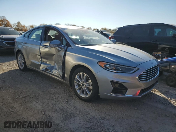 2020 Ford Fusion Hybrid SEL with VIN 3FA6P0MU6LR120463, listed as a Copart auction lot 77073464 with 38,716 mi miles and Salvage Title. Bid and sale history available at carsss.com. Image 4.