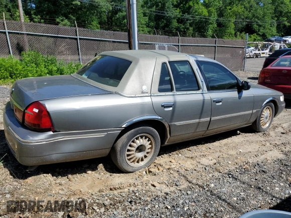 2000 Mercury Grand Marquis LS z VIN 2MEFM75W7YX694301, wystawiony jako Copart lot #57225295 z przebiegiem 141 420 mil mil oraz Szkoda całkowita • Salvage title. Historia ofert i sprzedaży dostępna na DreamBid. Obrazek 3.