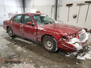 2001 Ford Crown Victoria LX z VIN 2FAFP74W21X206992, wystawiony jako Copart lot #45082985 z przebiegiem 137 954 mil mil oraz Szkoda całkowita • Salvage title. Historia ofert i sprzedaży dostępna na DreamBid. Obrazek 4.