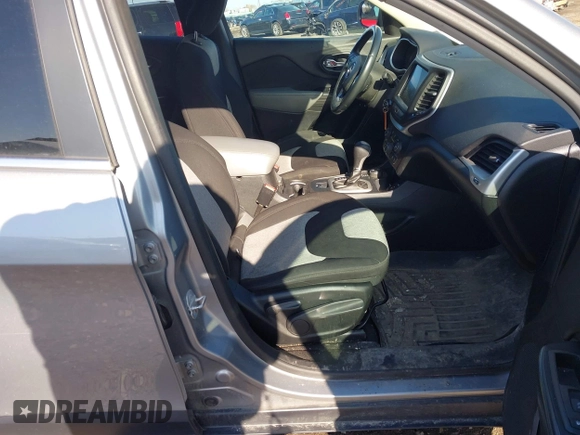 2014 Jeep Cherokee Latitude with VIN 1C4PJMCBXEW107559, listed as a IAAI auction lot 41859246 with 94,812 mi miles and . Bid and sale history available at DreamBid. Image 5.