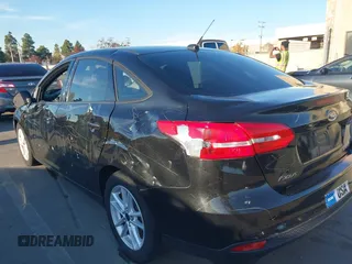 2015 Ford Focus SE with VIN 1FADP3F29FL350473, listed as a IAAI auction lot 41032182 with 102,898 mi miles. Bid and sale history available at carsss.com. Image 17.