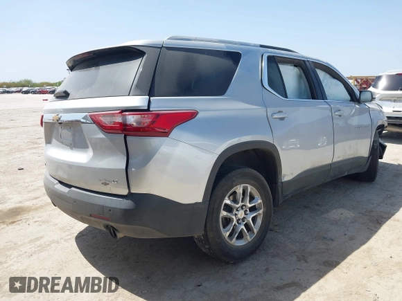 2018 Chevrolet Traverse LT Cloth z VIN 1GNERGKW3JJ173973, wystawiony jako IAAI lot #41860647 z przebiegiem 143 854 mil mil oraz . Historia ofert i sprzedaży dostępna na DreamBid. Obrazek 4.