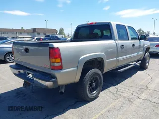 2003 GMC Sierra 2500HD SLT with VIN 1GTHK231X3F243264, listed as a IAAI auction lot 42606442 with 166,770 mi miles and . Bid and sale history available at DreamBid. Image 4.