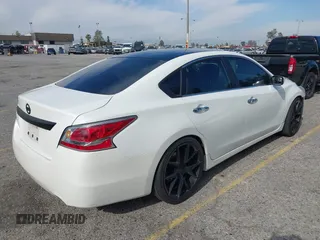 2014 Nissan Altima S with VIN 1N4AL3AP4EN223862, listed as a IAAI auction lot 42004392 with 140,450 mi miles and . Bid and sale history available at DreamBid. Image 4.