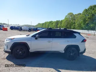 2021 Toyota RAV4 Hybrid XSE with VIN JTME6RFV4MJ008825, listed as a IAAI auction lot 42060148 with 91,129 mi miles and . Bid and sale history available at DreamBid. Image 14.