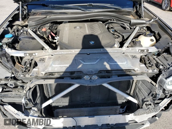 2021 BMW X4 M40i with VIN 5UX2V5C06M9E04443, listed as a Copart auction lot 72061194 with 71,637 mi miles and Salvage title. Bid and sale history available at DreamBid. Image 12.