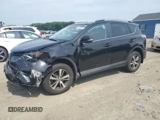 2018 Toyota RAV4 XLE with VIN 2T3RFREV7JW752418, listed as a Copart auction lot 60838305 with 58,954 mi miles and Salvage title. Bid and sale history available at DreamBid. Image 1.