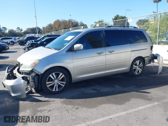 2005 Honda Odyssey TOURING with VIN 5FNRL38865B128519, listed as a IAAI auction lot 41830182 with 171,010 mi miles. Bid and sale history available at carsss.com. Image 15.