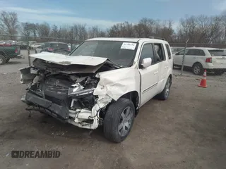 2015 Honda Pilot Touring with VIN 5FNYF4H9XFB047607, listed as a IAAI auction lot 41781534 with 157,252 mi miles. Bid and sale history available at carsss.com. Image 17.