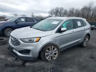 2019 Ford Edge Titanium with VIN 2FMPK4K95KBB55619, listed as a IAAI auction lot 42048941 with 89,999 mi miles. Bid and sale history available at carsss.com. Image 2.