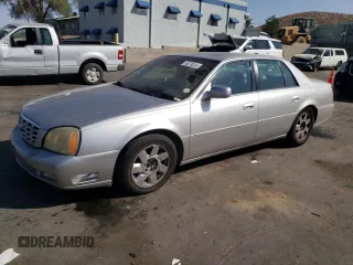 2004 Cadillac DeVille DTS z VIN 1G6KF57994U203706, wystawiony jako Copart lot #76278324 z przebiegiem 203 709 mil mil oraz Szkody całkowita. Historia ofert i sprzedaży dostępna na DreamBid. Obrazek 1.