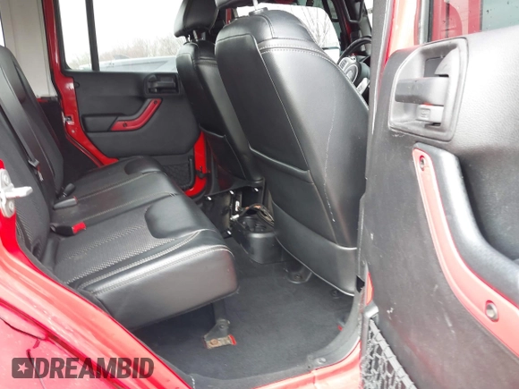 2015 Jeep Wrangler Unlimited Sahara with VIN 1C4BJWEG3FL590491, listed as a IAAI auction lot 41642219 with 148,759 mi miles. Bid and sale history available at carsss.com. Image 8.
