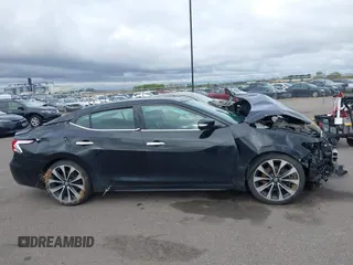 2016 Nissan Maxima SR z VIN 1N4AA6AP9GC386237, wystawiony jako IAAI lot #42166280 z przebiegiem 130 091 mil mil oraz . Historia ofert i sprzedaży dostępna na DreamBid. Obrazek 14.