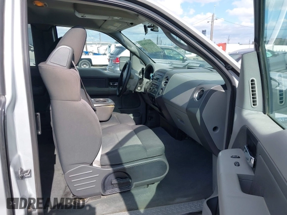 2007 Ford F-150 STX with VIN 1FTRX14W87KC40659, listed as a IAAI auction lot 41423345 with 145,811 mi miles. Bid and sale history available at carsss.com. Image 5.
