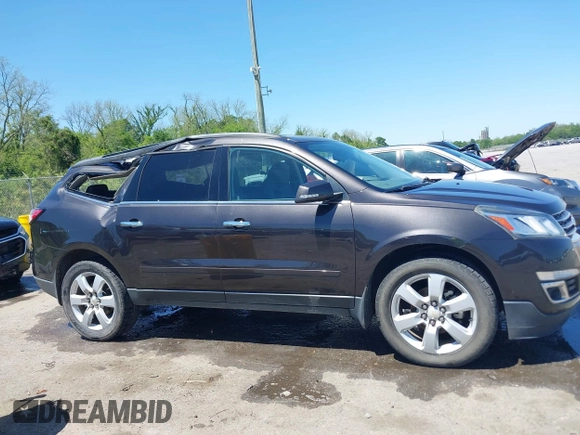 2017 Chevrolet Traverse LT with VIN 1GNKRGKD7HJ129888, listed as a IAAI auction lot 42009764 with 136,091 mi miles and . Bid and sale history available at DreamBid. Image 13.