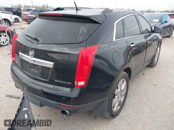 2011 Cadillac SRX Performance Collection with VIN 3GYFNBEY9BS625623, listed as a IAAI auction lot 41731357 with 163,245 mi miles. Bid and sale history available at carsss.com. Image 4.