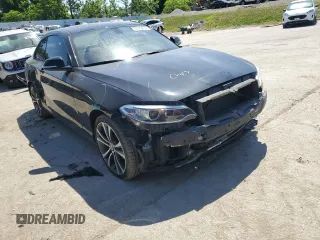 2014 BMW 2 Series 228i with VIN WBA1F5C58EV256093, listed as a Copart auction lot 57579434 with 74,596 mi miles and Salvage Title. Bid and sale history available at carsss.com. Image 4.