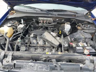 2006 Ford Escape XLT with VIN 1FMYU03146KB87070, listed as a IAAI auction lot 41451676 with 180,415 mi miles. Bid and sale history available at carsss.com. Image 10.