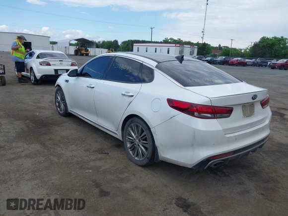 2016 Kia Optima SXL Turbo with VIN 5XXGV4L26GG067859, listed as a IAAI auction lot 42223073 with 133,511 mi miles and . Bid and sale history available at DreamBid. Image 3.