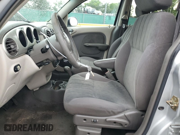 2002 Chrysler PT Cruiser Touring z VIN 3C4FY58B32T288205, wystawiony jako Copart lot #61591295 z przebiegiem 156 379 mil mil oraz Szkoda całkowita • Salvage title. Historia ofert i sprzedaży dostępna na DreamBid. Obrazek 7.